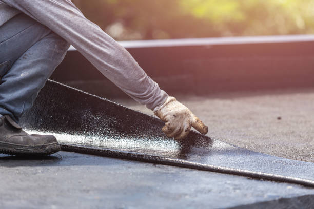 Professional Waterproofing technician working in Bellevue, KY